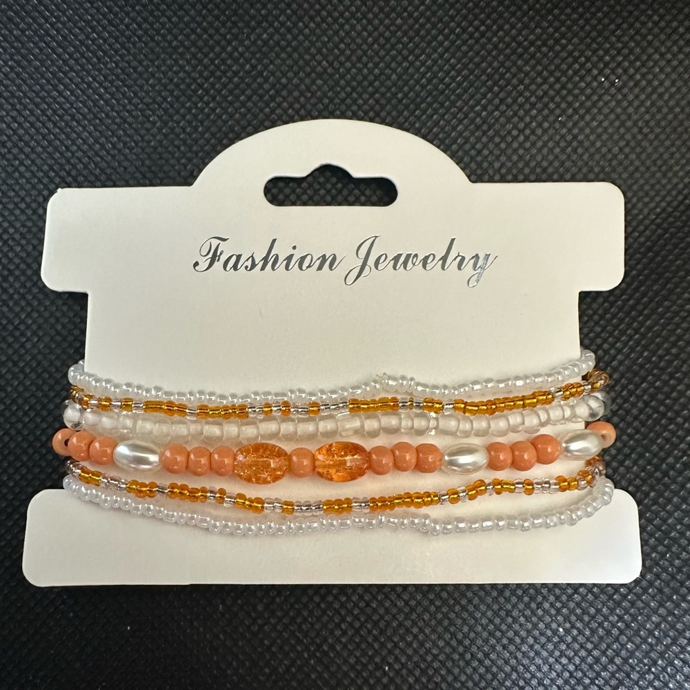 Orange and White Beaded Bracelet Set
